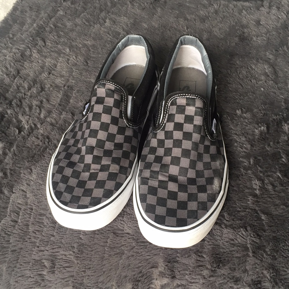 Vans grey and black checkered slip-ons